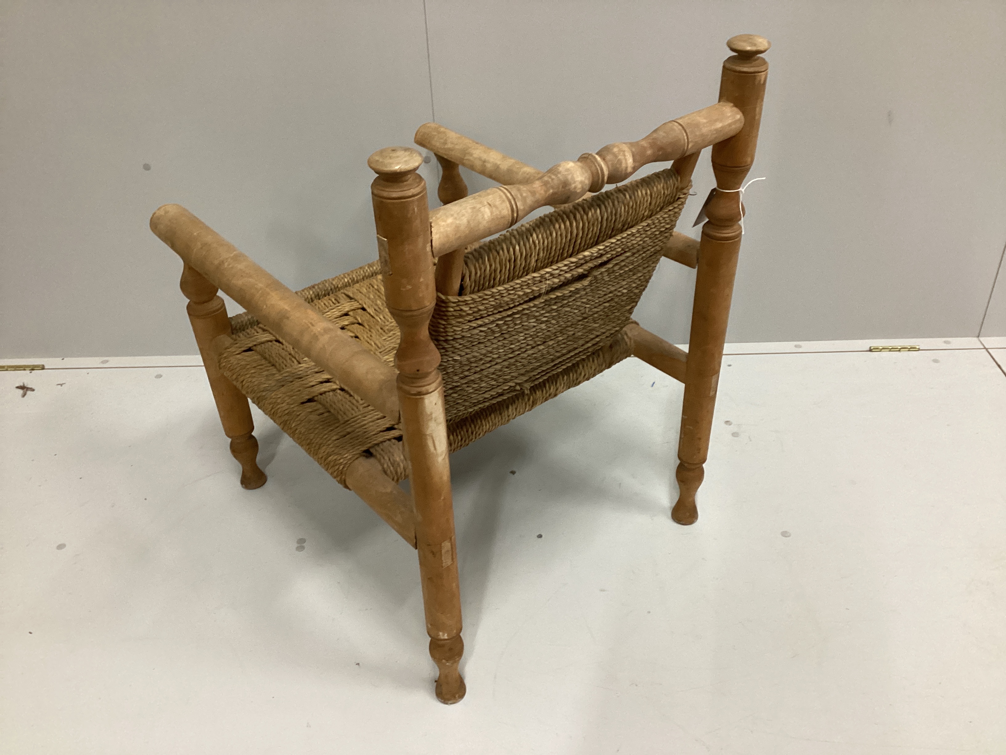 In the manner of Adrien Audoux and Frida Minet, a sisal weave beech elbow chair, width 60cm, depth 74cm, height 84cm